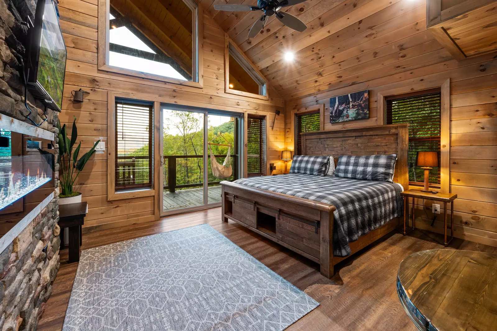 bedroom with fireplace in Smoky Mountain cabin
