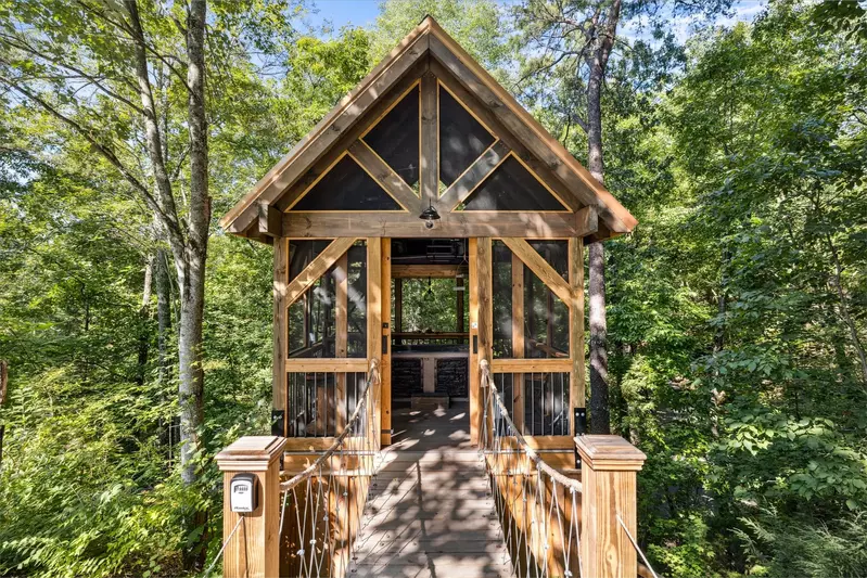 screened in structure with hot tub